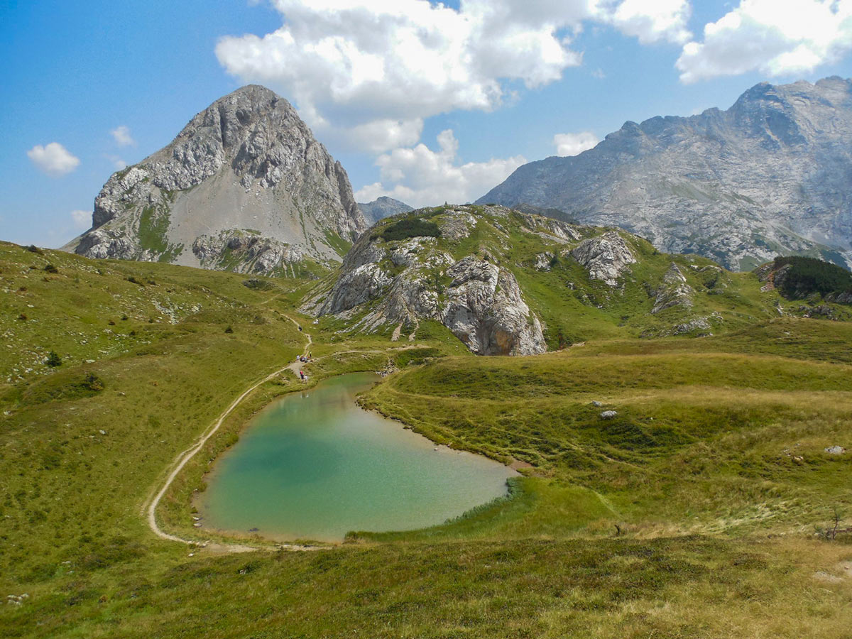 Hiking around mountain lakes in the friulian dolomites Italy