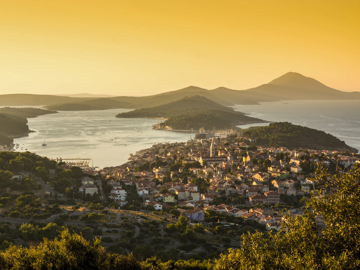 Sunset hike above mediterranean city walking adventure tour Croatia