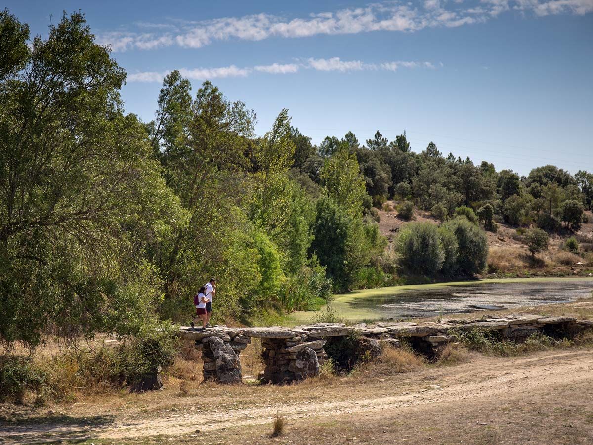 Stone bridges paths through marsh Douro National Park adventure tour Portugal