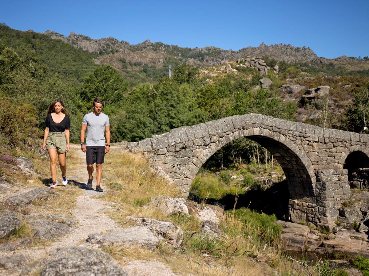 Exploring old hike pathes stone bridges Peneda Geres Hiking adventure tour Portugal