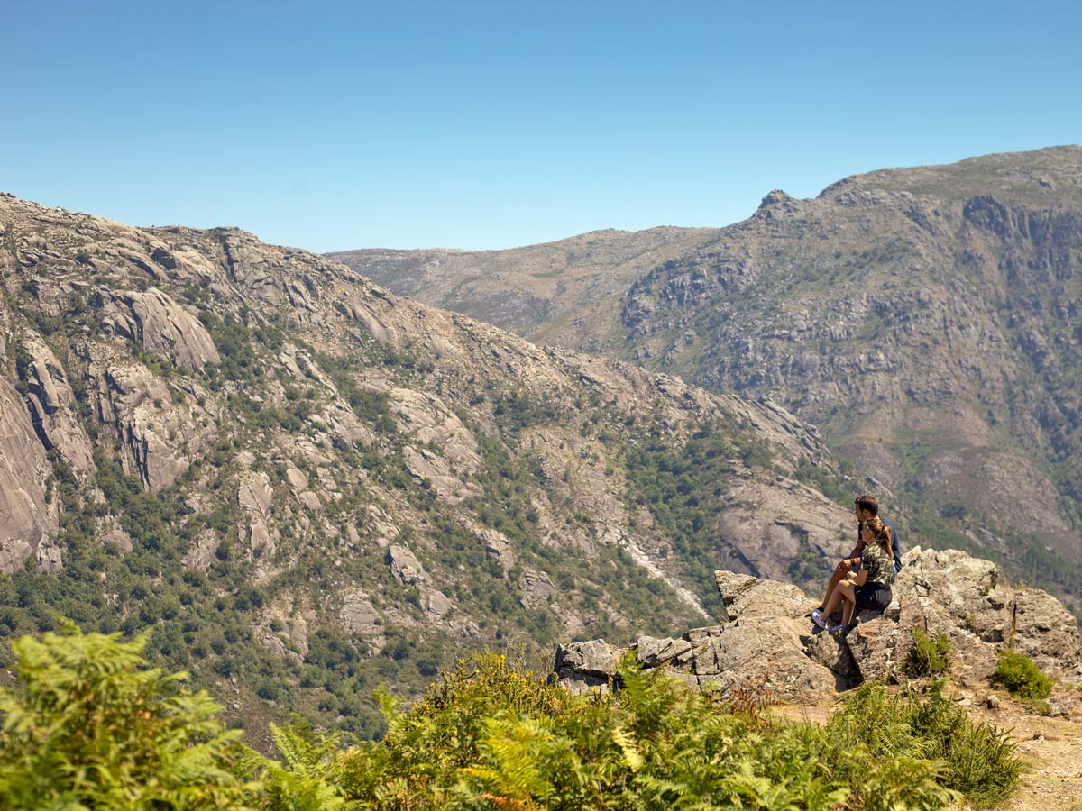 Couple hikers enjoying views Peneda Geres Hiking adventure tour Portugal