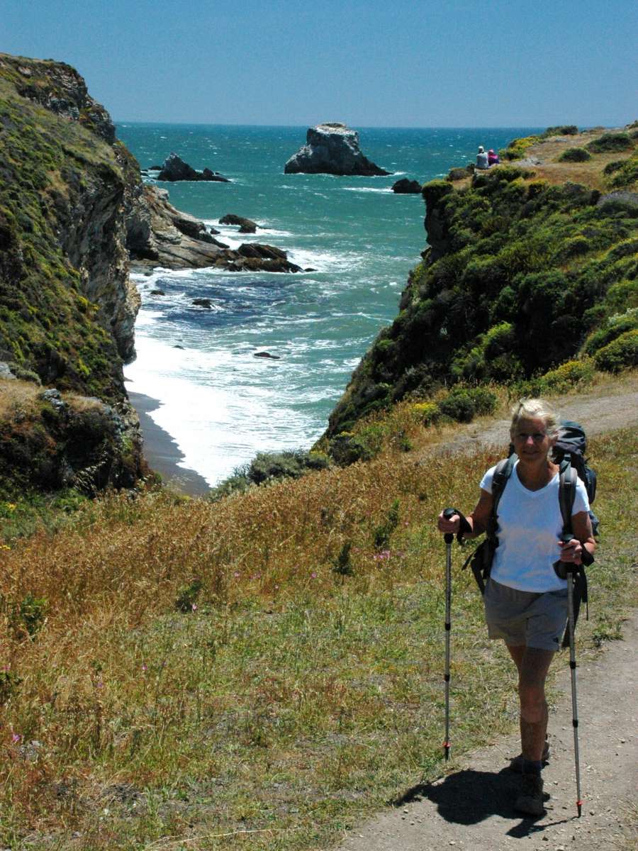 Happy hiker on a guided tour in Point Reyes