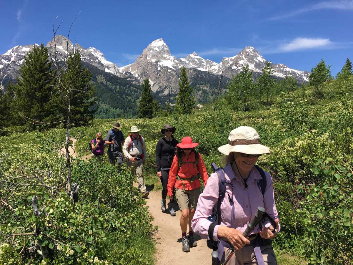 Walking in front of beautiful mountains in Yellowstone