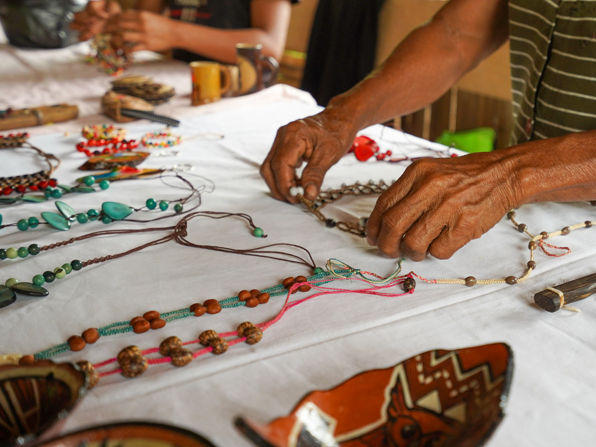 Traditional macrame jewellry Peru Galapagos Amazon family kayak tour