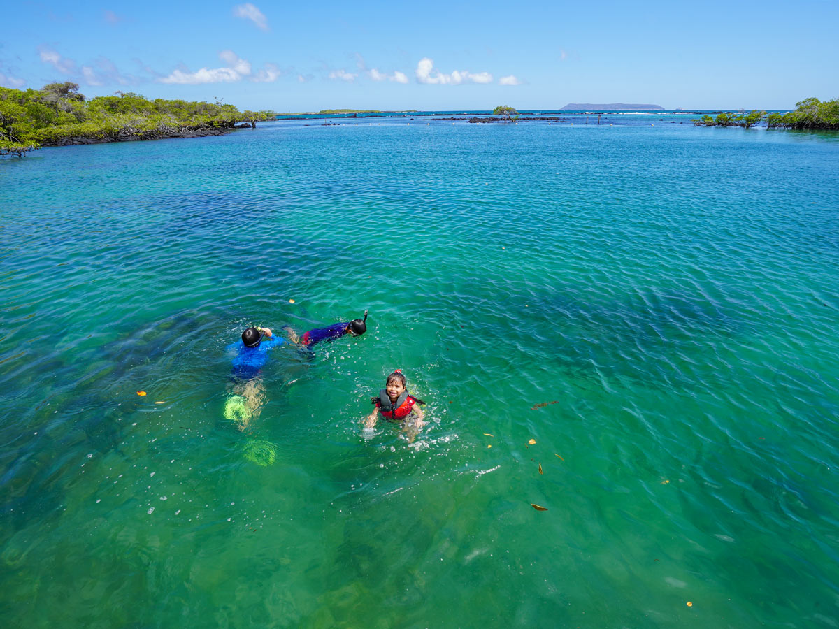 Kids snorkelling swimming