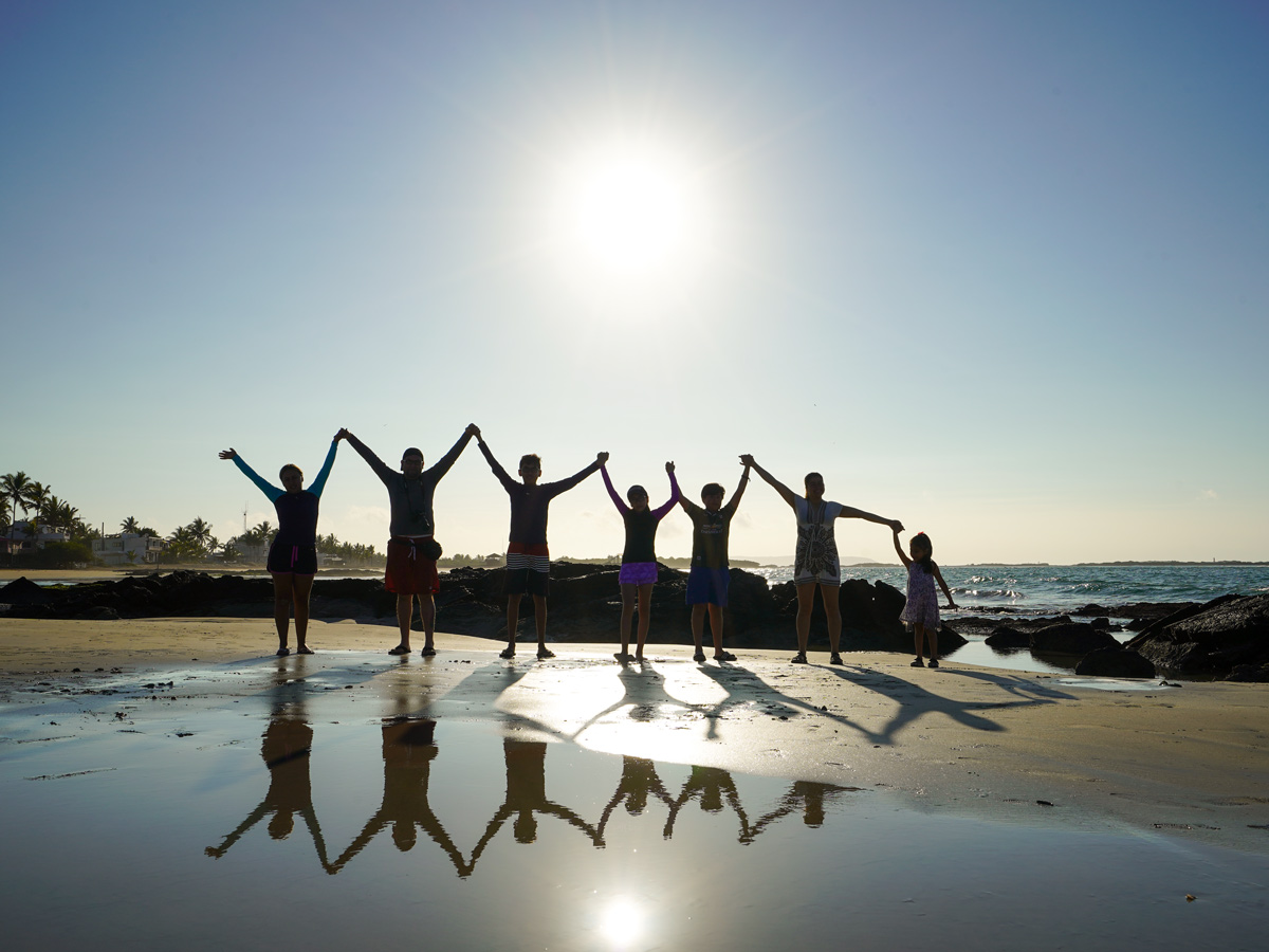 Family sunset beach