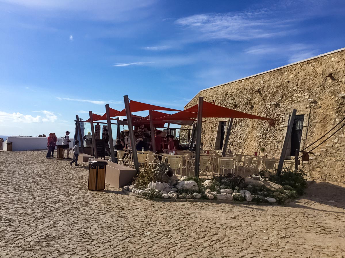 Cafe market by the ocean beach exploring Portugal coast walking tour