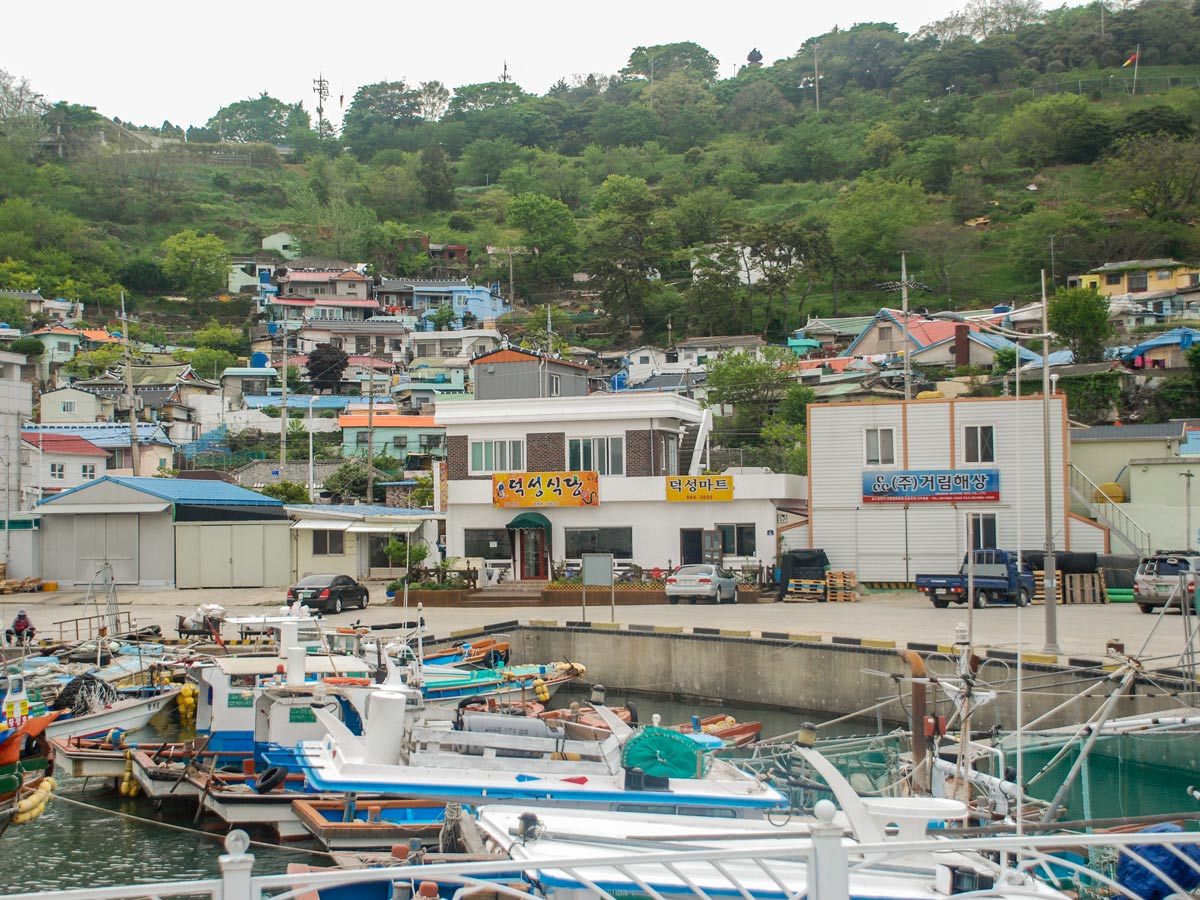 Boat docks harbour village South Korea adventure trekking tour asia