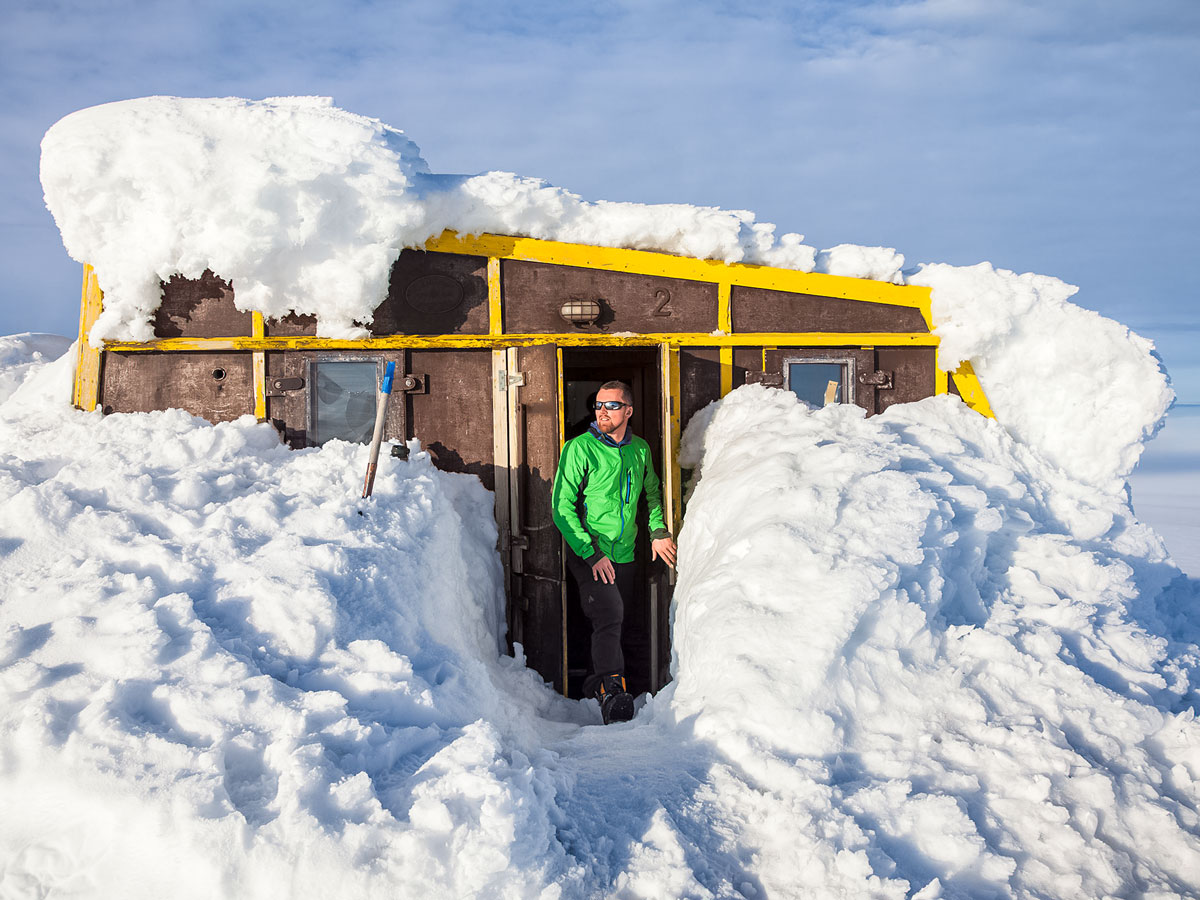 Cabin shelter burried in snow Vatnajokull ski trekking adventure tour Iceland