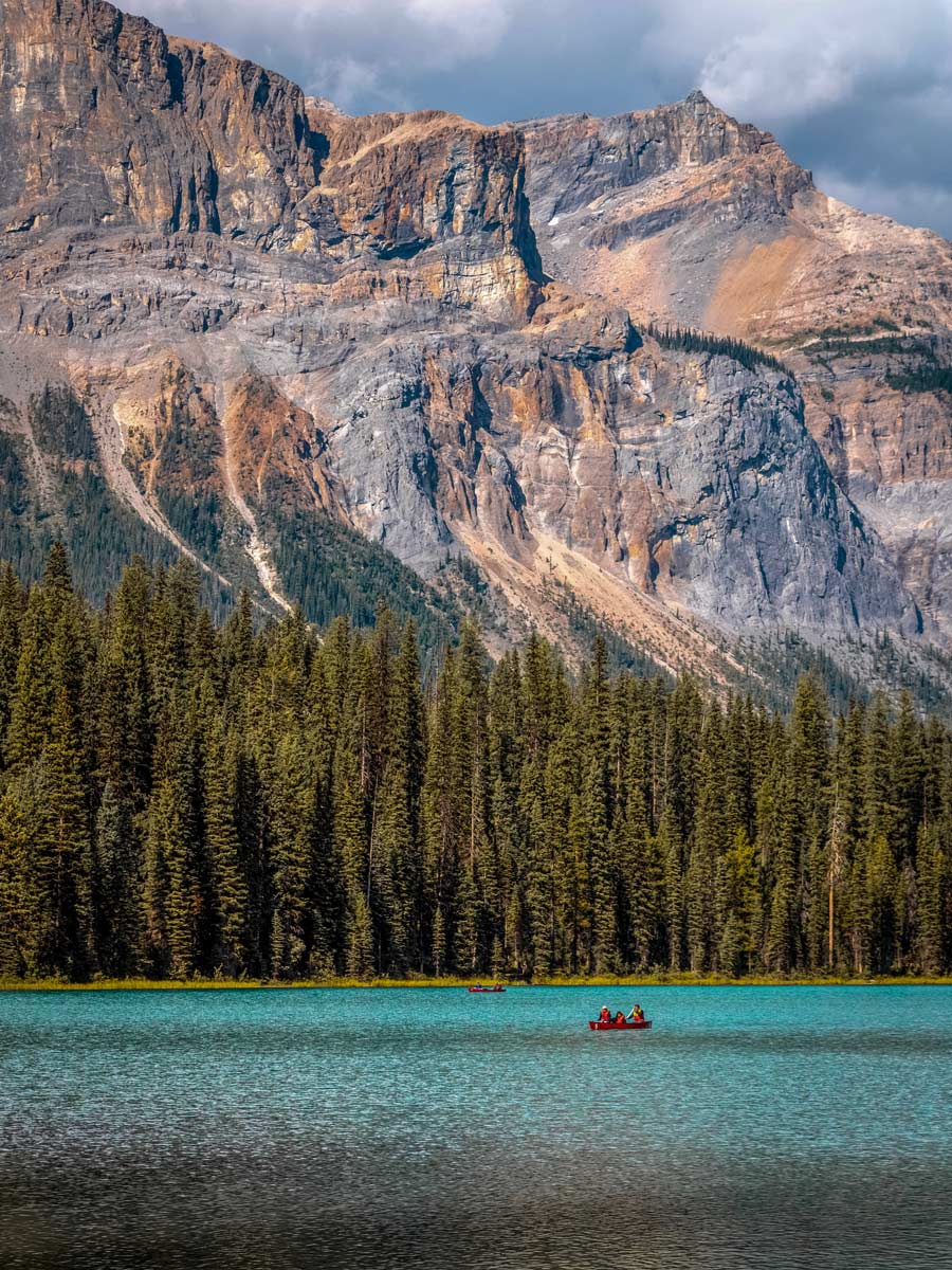 Paddling canoeing natural lake rocky mountain Golden British Columbia BC Canada