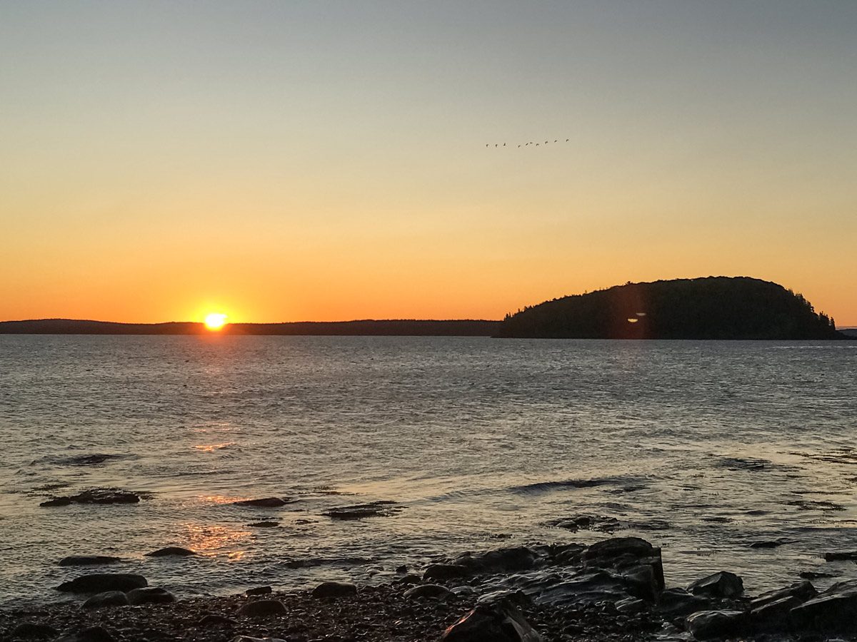 Sunset over the lake Acadia National Park Maine adventure tour