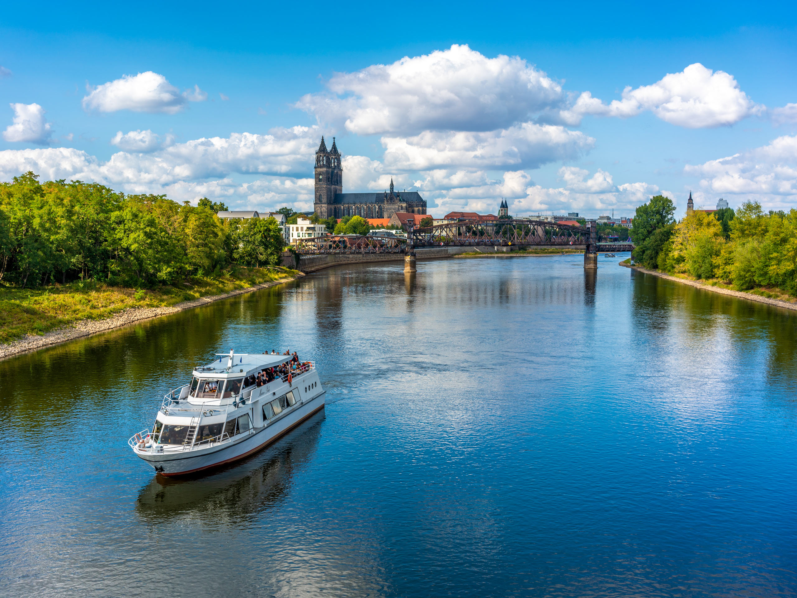Boat magdeburg city on the shore of river elbe