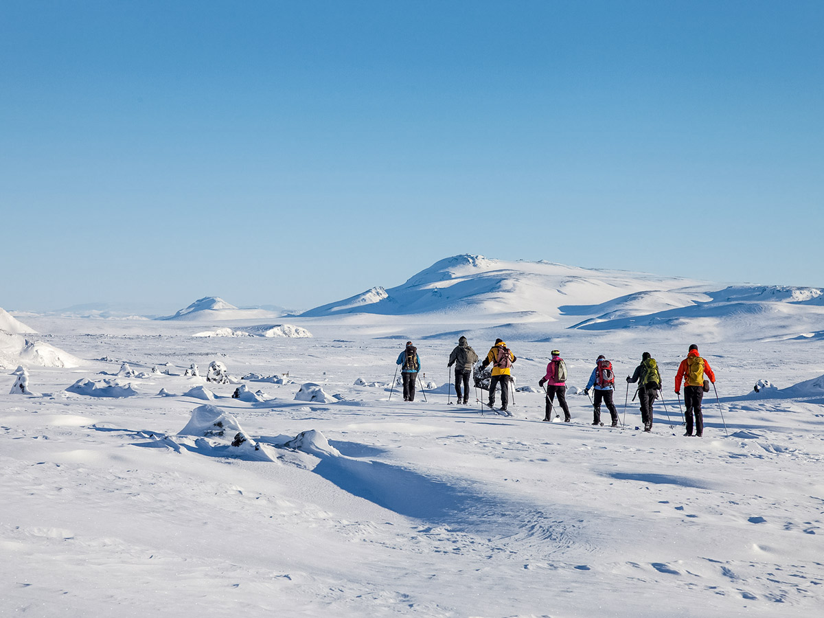 Touring group ski large Icelandic ice field Landmannalaugar cross country nordic ski trek