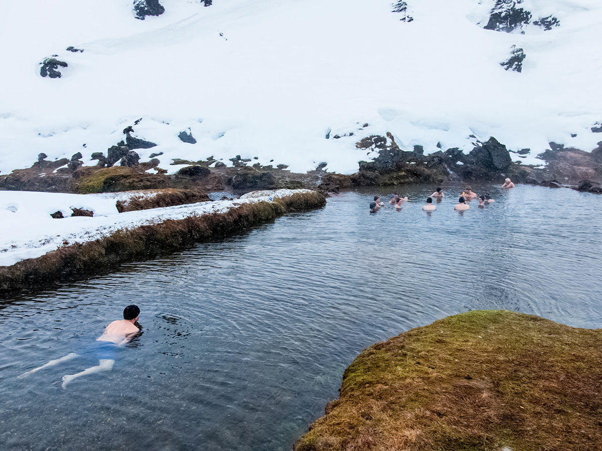Post skiing soak in natural geothermal hotsprings pools Landmannalaugar cross country nordic ski adventure trek