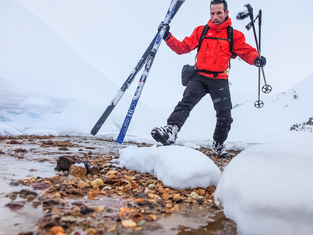 Crossing geothermal creek Landmannalaugar cross country nordic ski trek