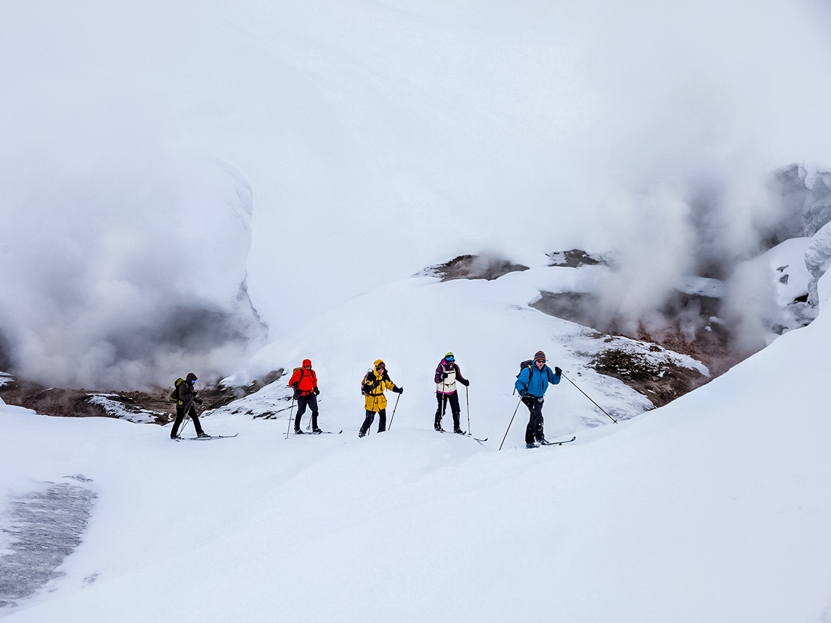Skiing tour group Landmannalaugar cross country nordic ski adventure trek