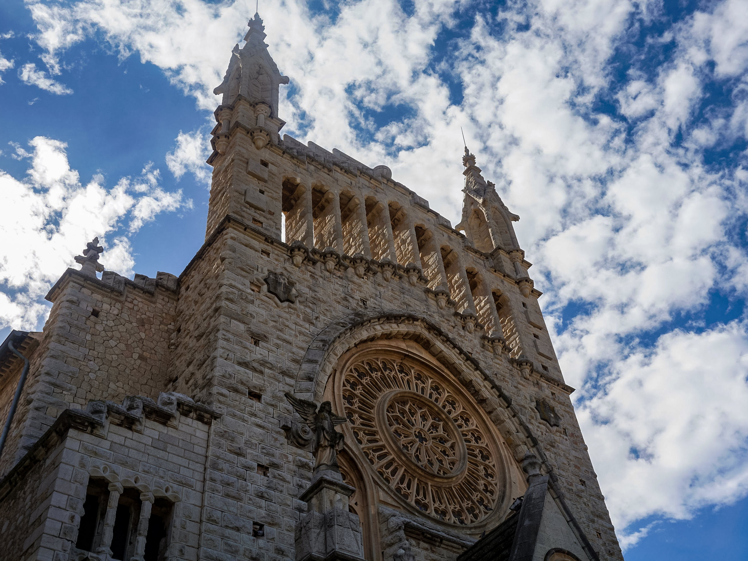 Small historic Soller church stone building walking around Mallorca Spain