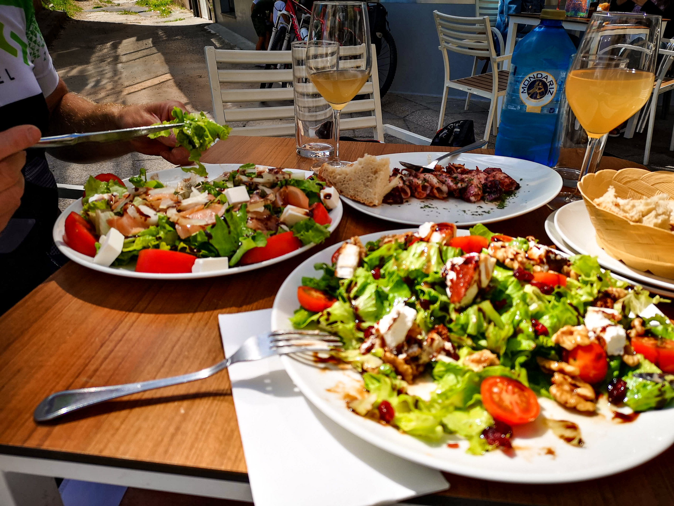 Enjoying salads drinks spanish food Camino Sanabres Spain