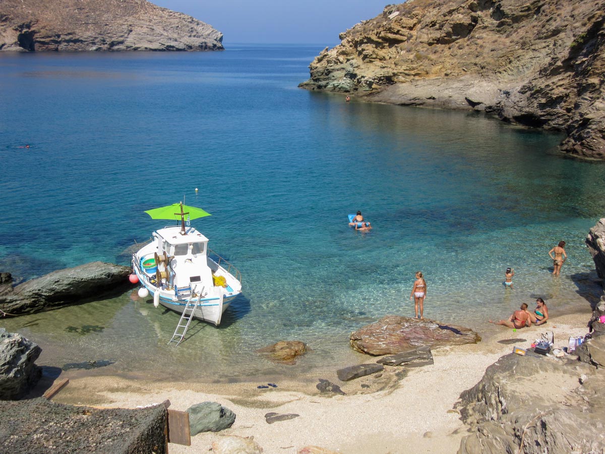 Achla Bay with Boat family beach day andros tinos wlaking exploring Greece