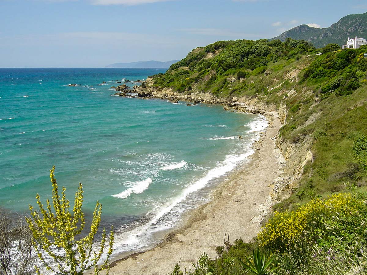 Beautiful secluded beach Mediterranean Sea Corfu Paxos Greece adventure tour