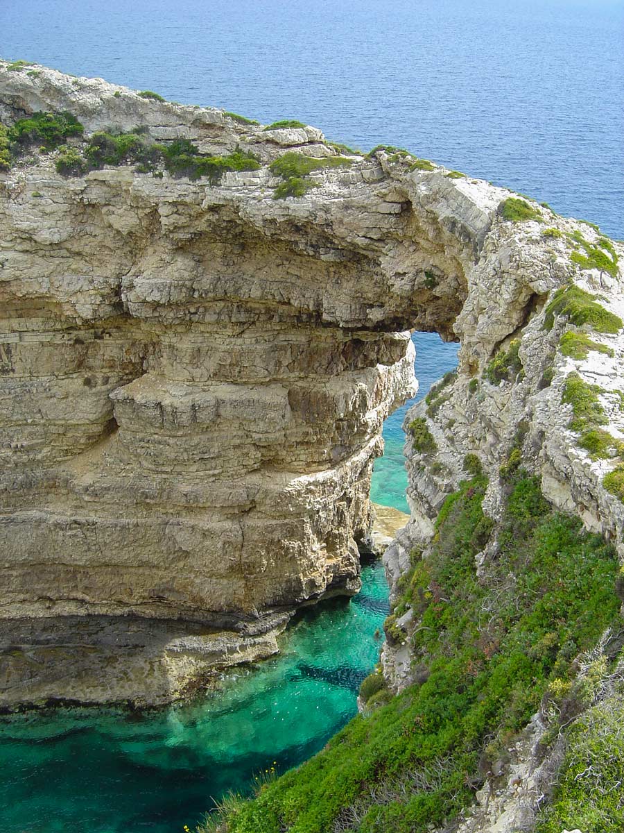 Natural rock bridge Mediterranean Sea Corfu Paxos Greece adventure tour