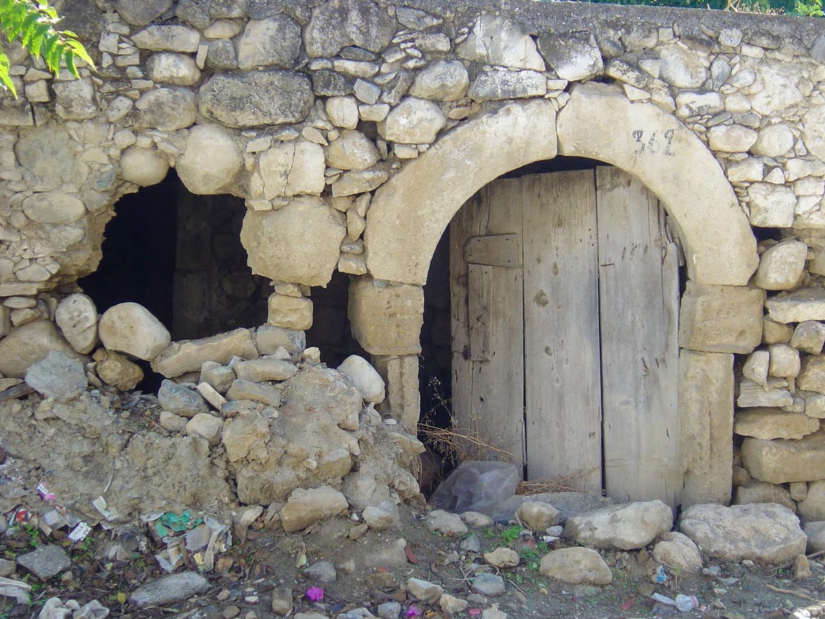 Home hidden in rocks Petrokefali Crete Greece coastline adventure tour