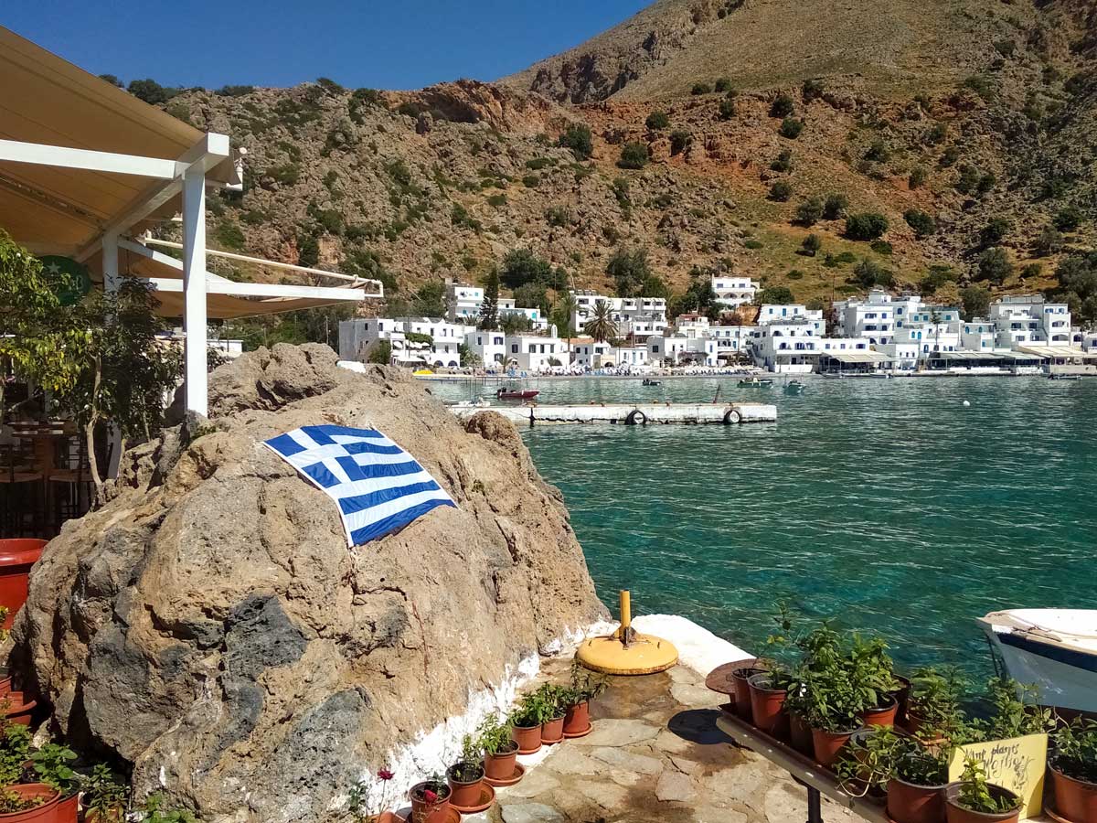 Mediterranean bay greek flag family adventure tour Crete Greece