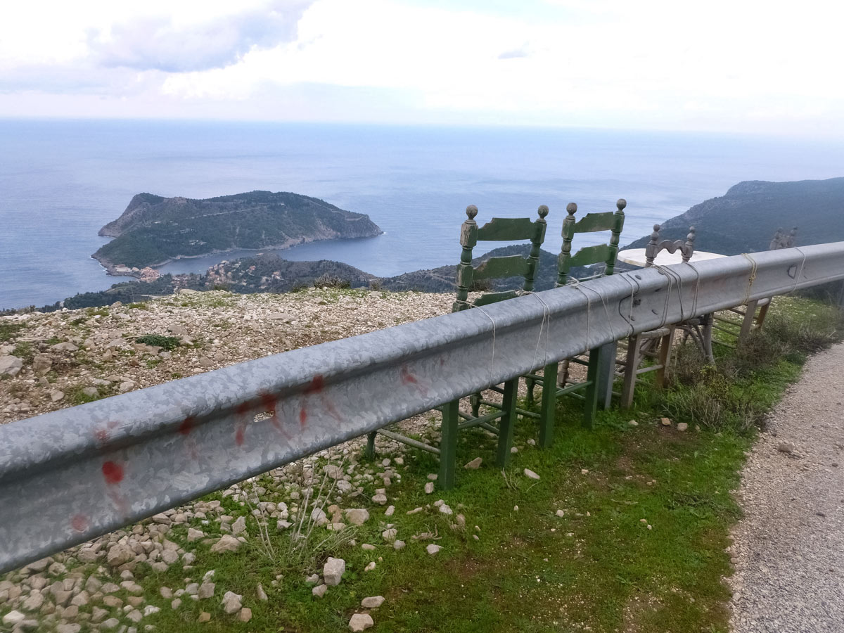 Chairs lookout over mediterranean sea Greece Kefalonia adventure bike cycling tour