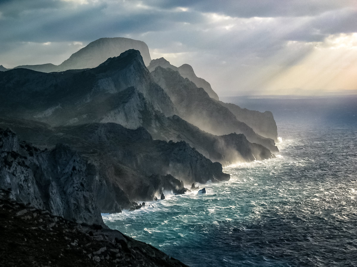 Rocky cliffs mediterranean sea walking hiking tour Karpathos Greece