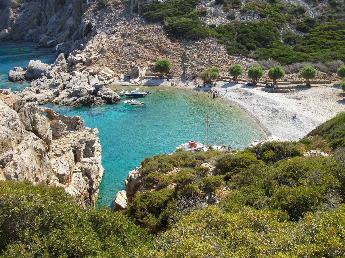 Remote secluded beach mediterranean sea walking hiking tour Karpathos Greece