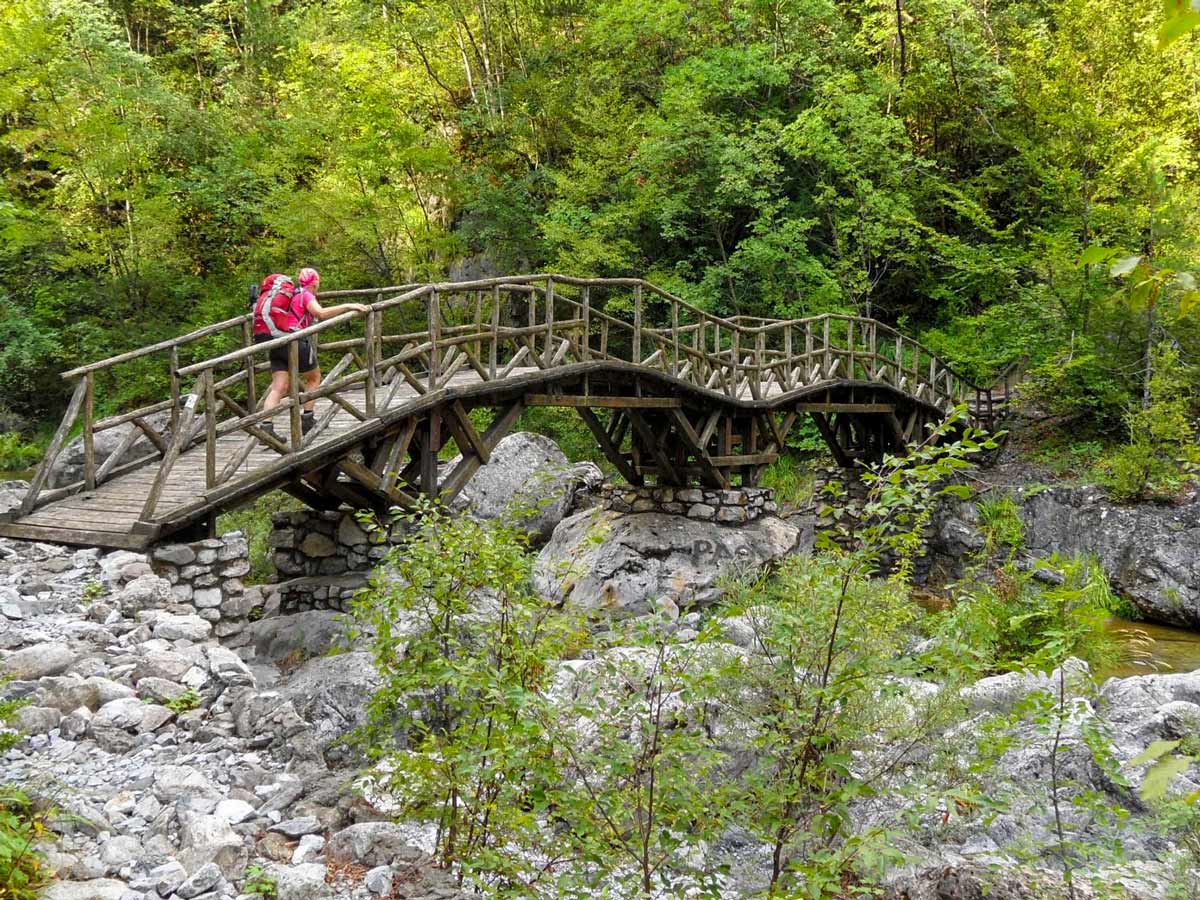 Old wooden bridge hiking Mount Olympos trekking adventure northern Greece