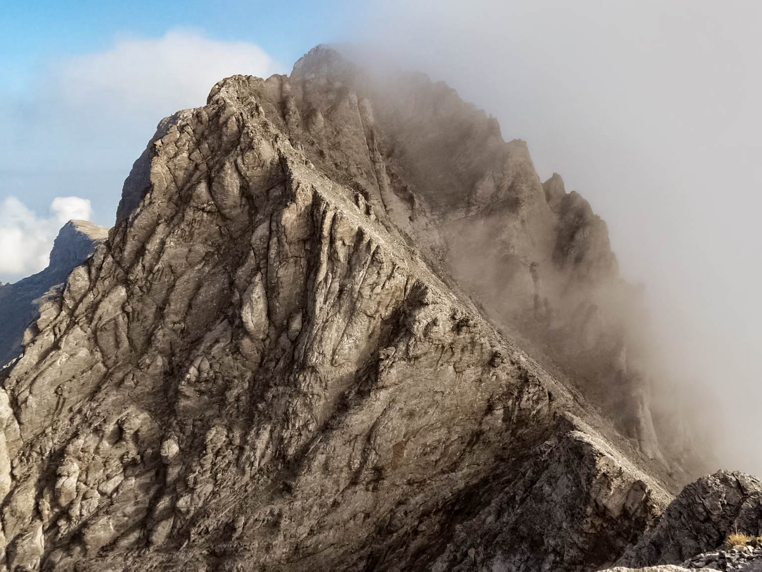 Fog cloudy rock peak summit Mount Olympos Greece