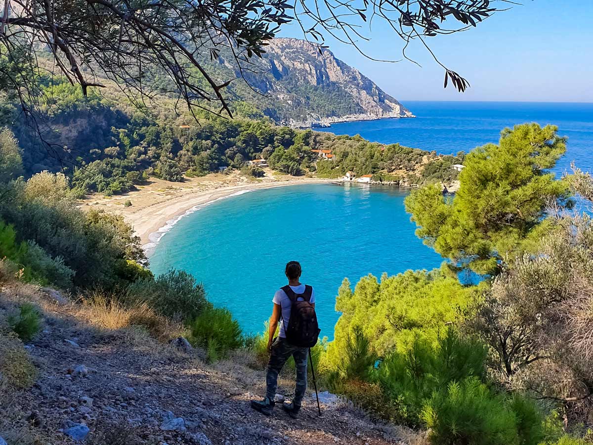 Hiking above mediterranean bay cove Samos Island Greece walking tour