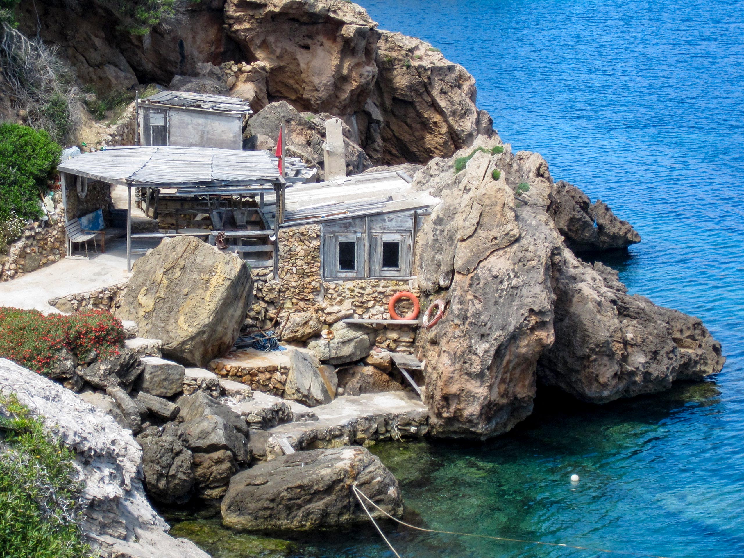Fishermens cabin by the ocean walking tour Menorca Spain