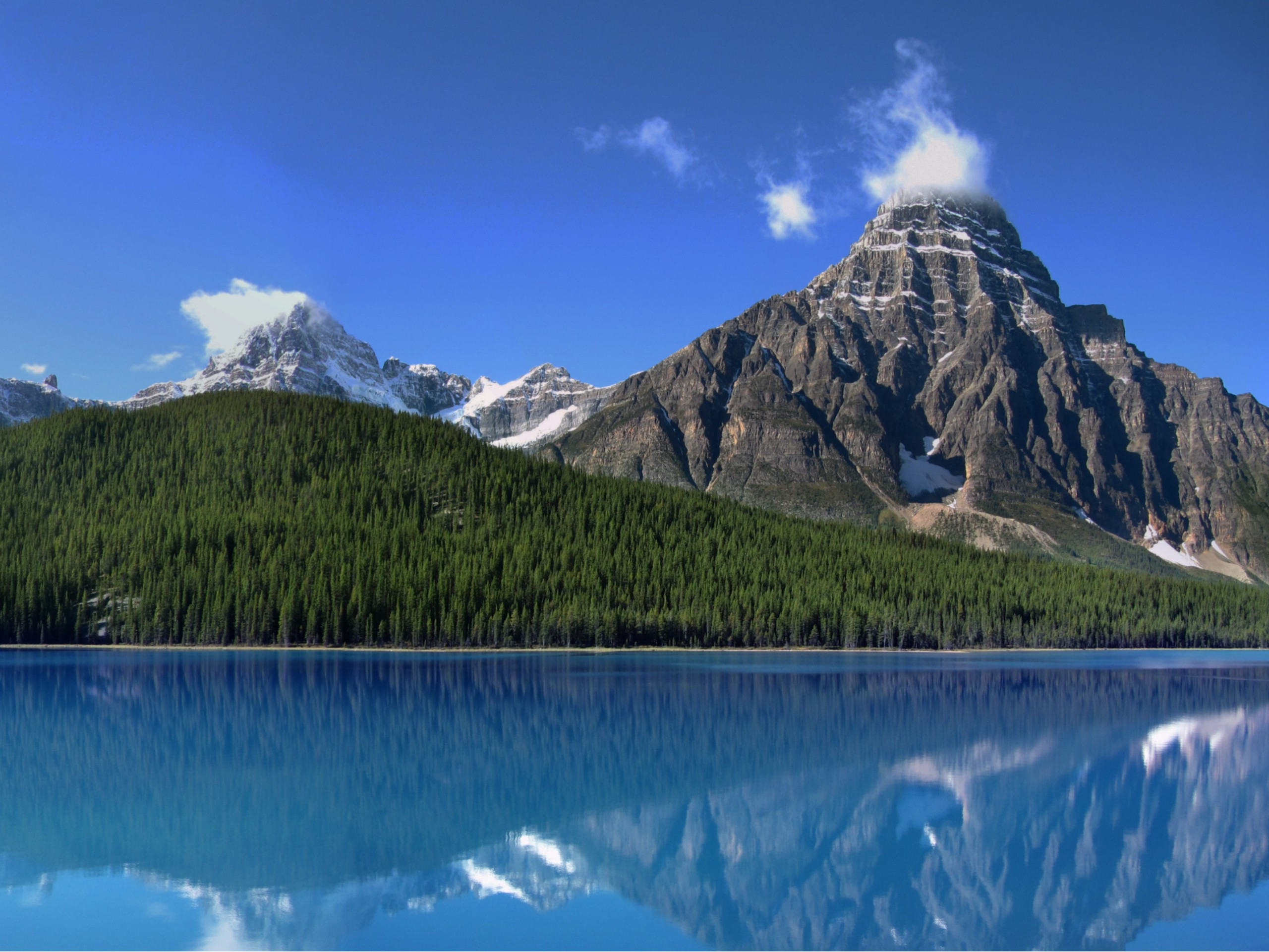 Reflections in the blue water in Jasper national park