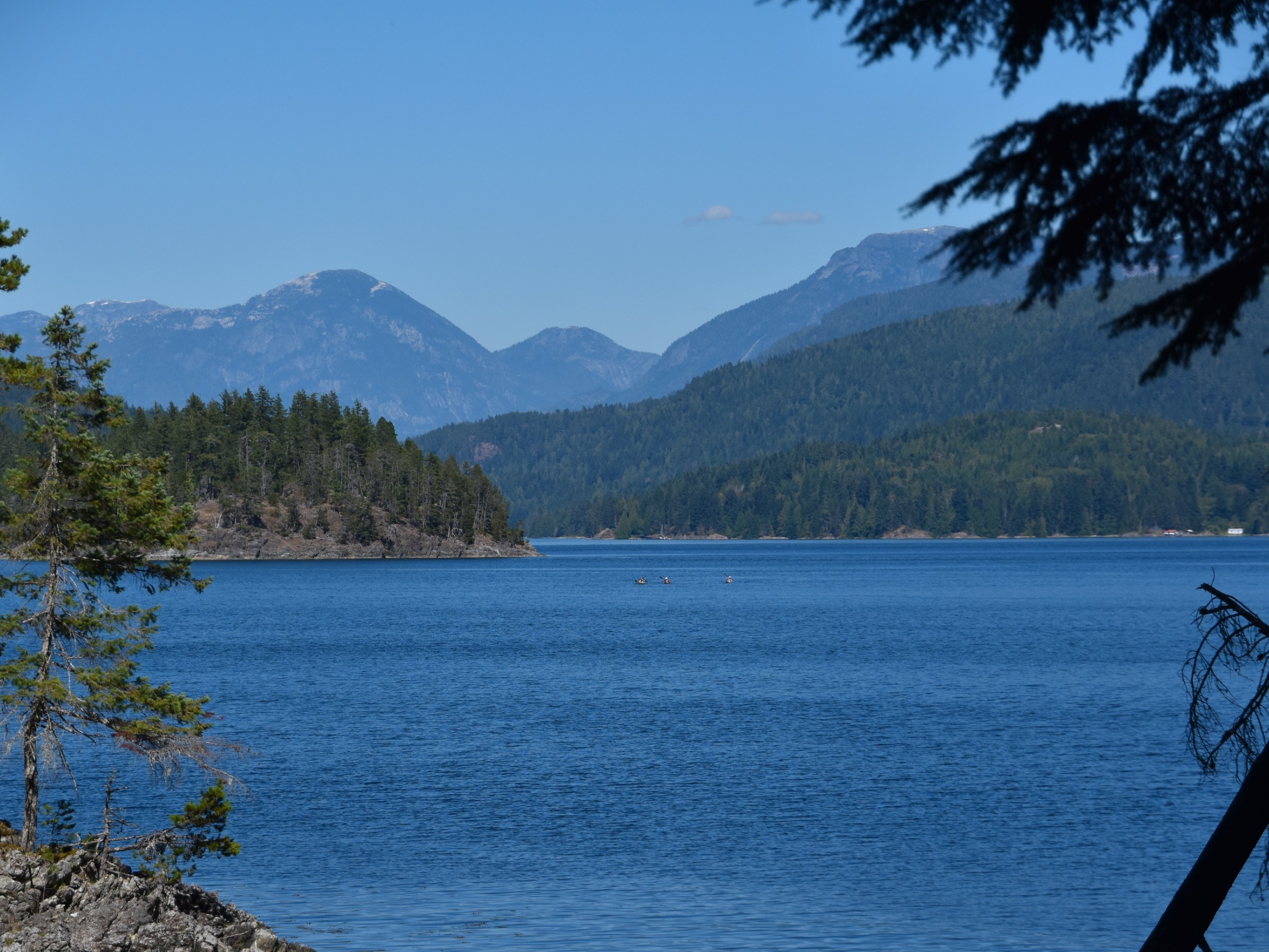 Three kayakers in Quadra Island