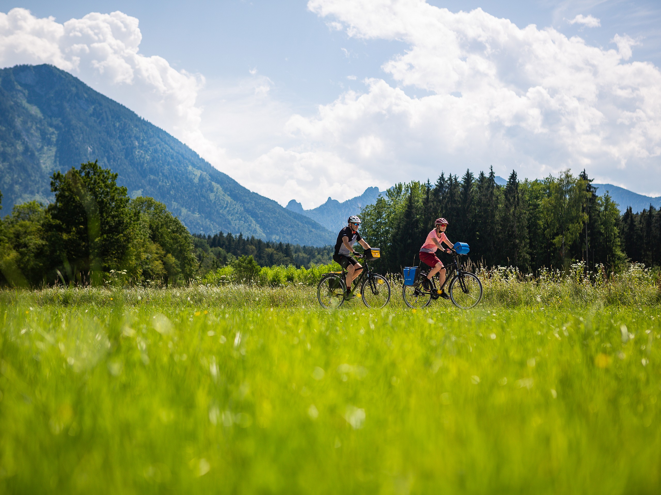 Two cyclists biking in Austria