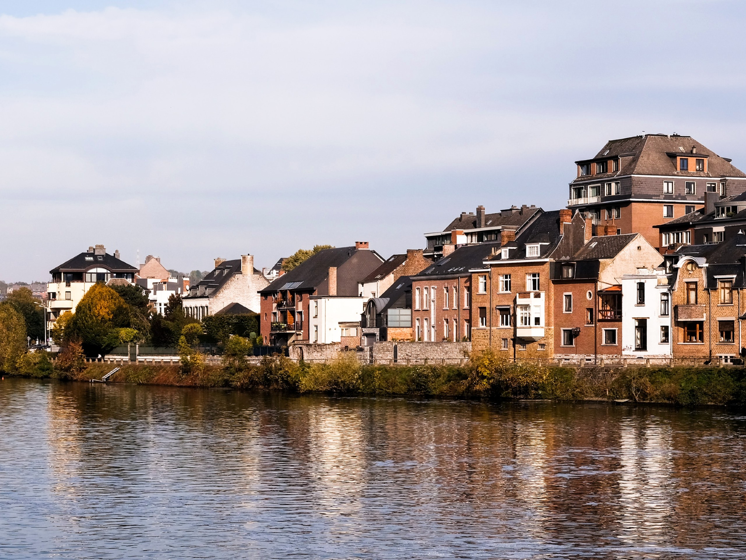 Beautiful buildings along the river, seen on self-guided biking tour