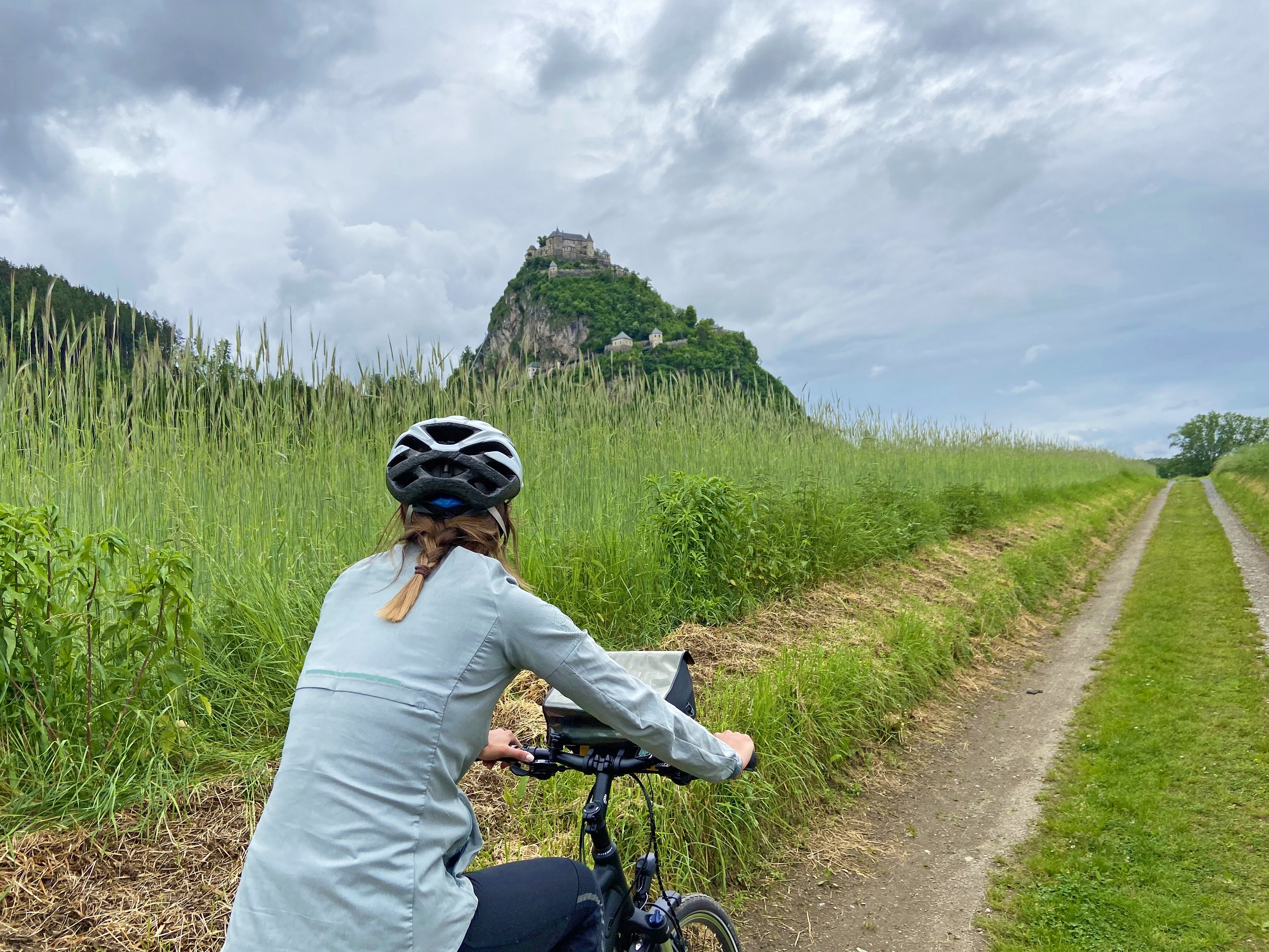 Cyclist biking on the gravel path in Austria