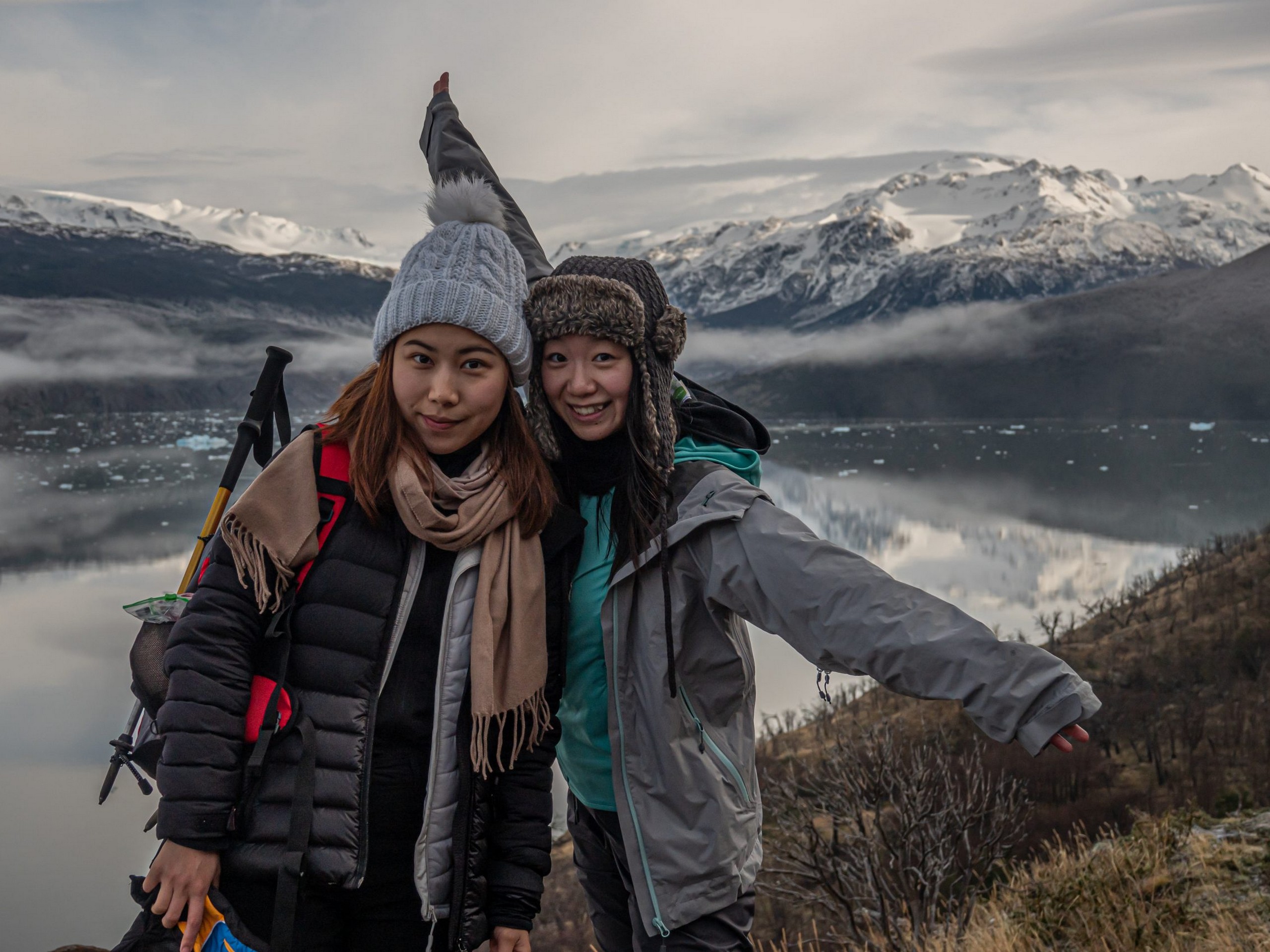 Two girls posing in front of the stunning scenery in Patagonia