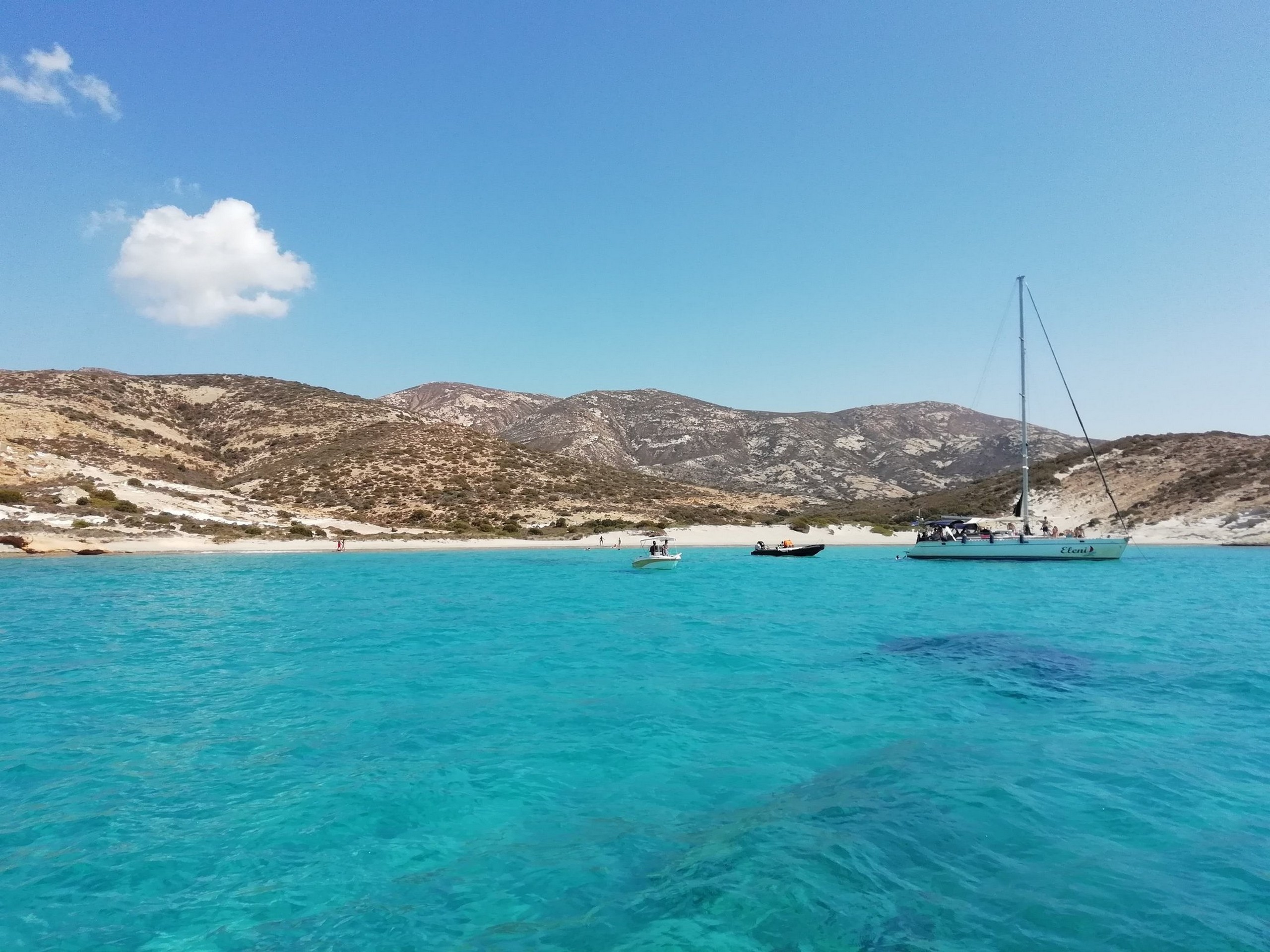 Sailing near the shores of one of the Cyclades Islands