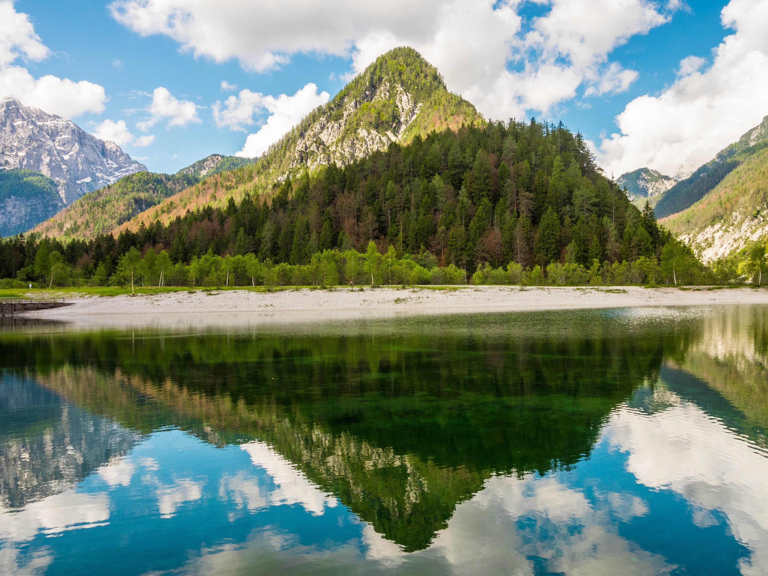 Beautiful mountain reflections in the water in Slovenia
