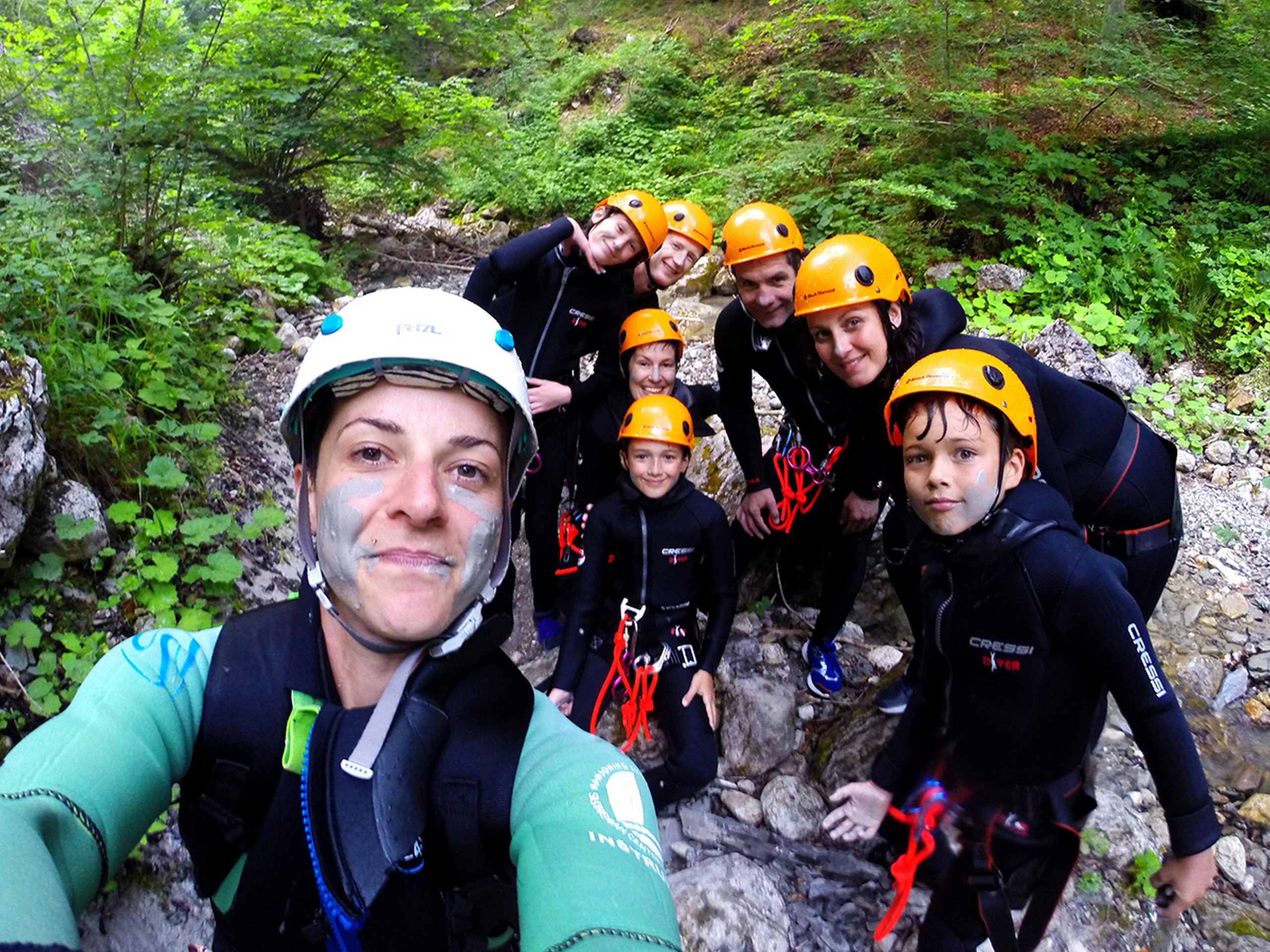 Family on rock climbing activity in Slovenia