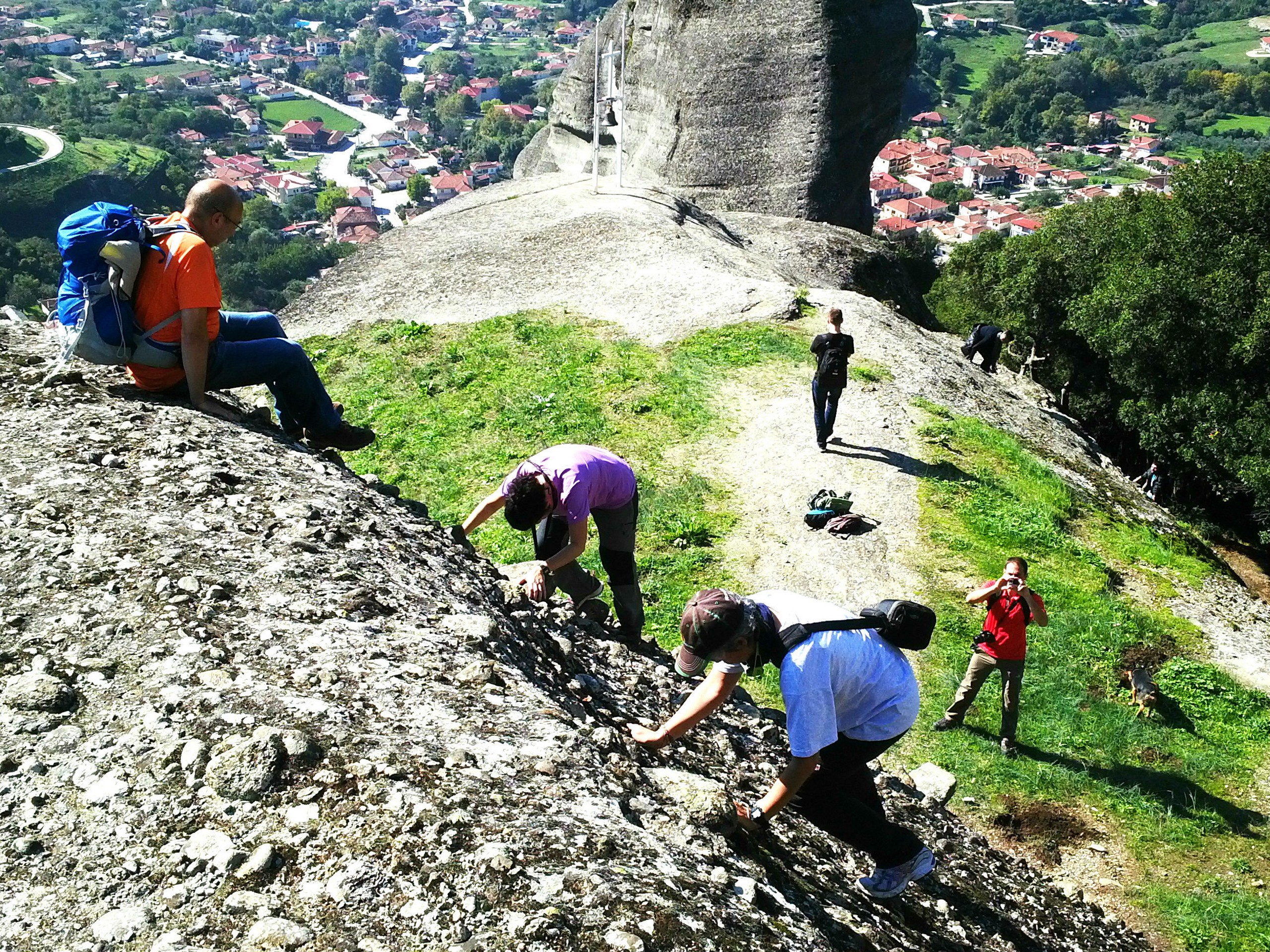 Hikers climbing Meteora in Greece