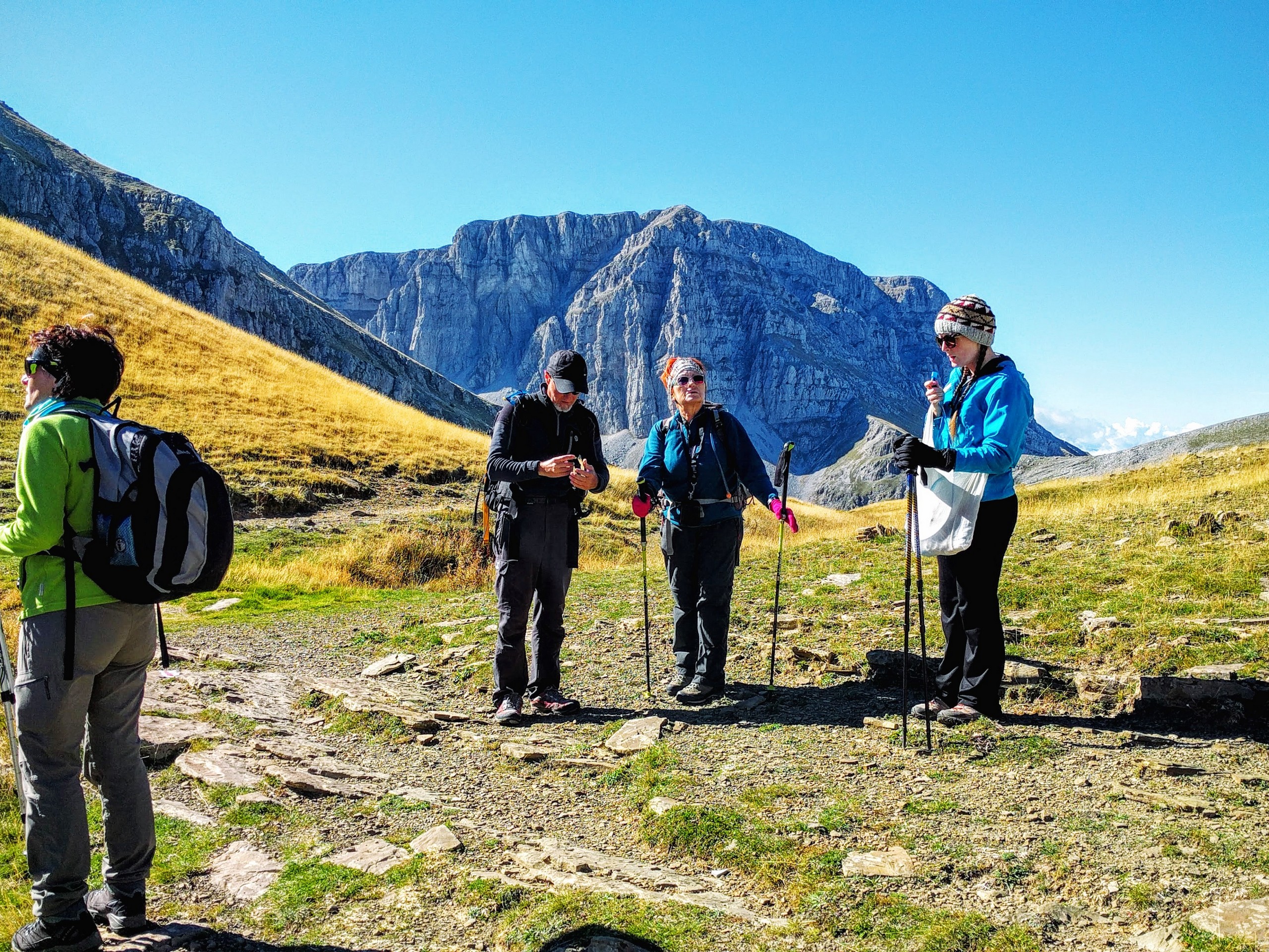 Group of hikers enjoying the sunny day in Zagori muntains Greece