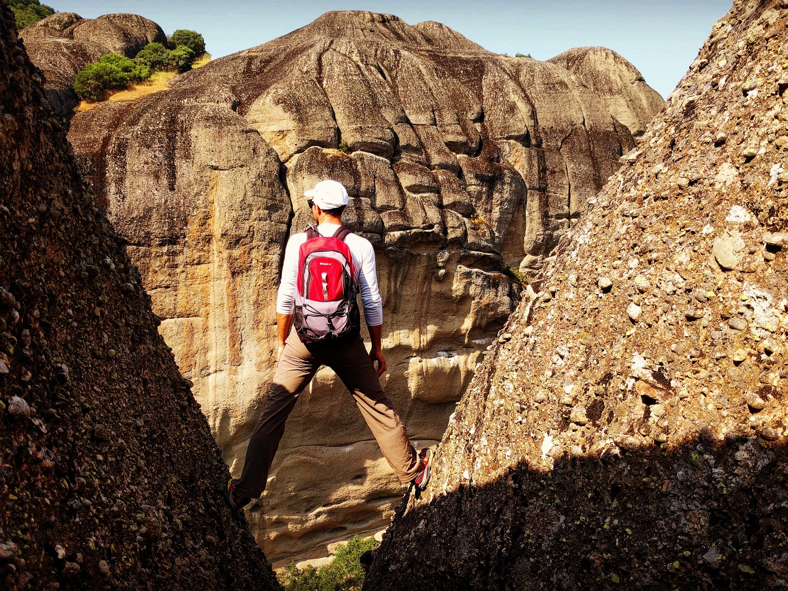 Hiker posing in front of the gorge in Greece