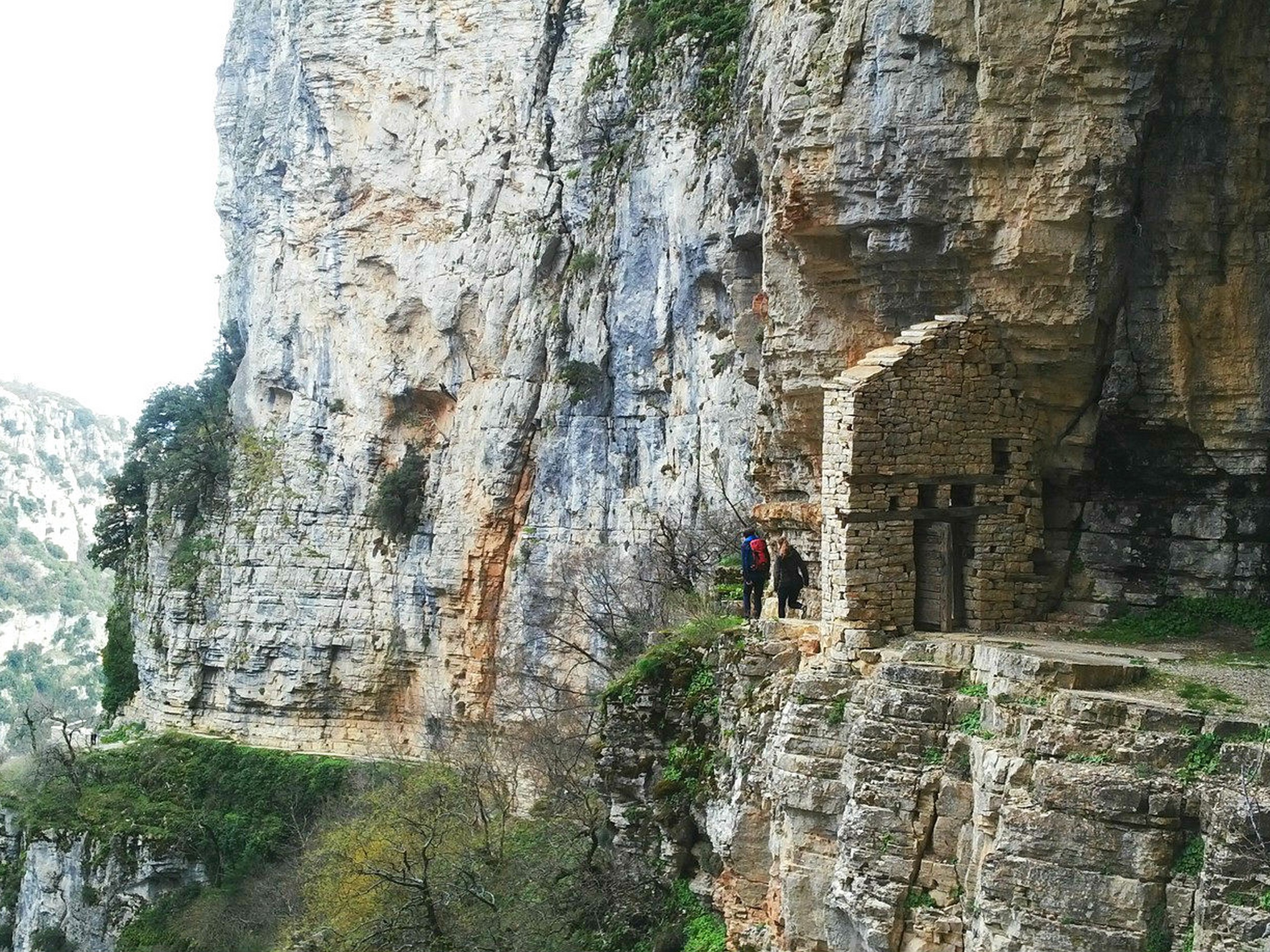 Hikers in Zagori Mountains near the Vikos Gorge