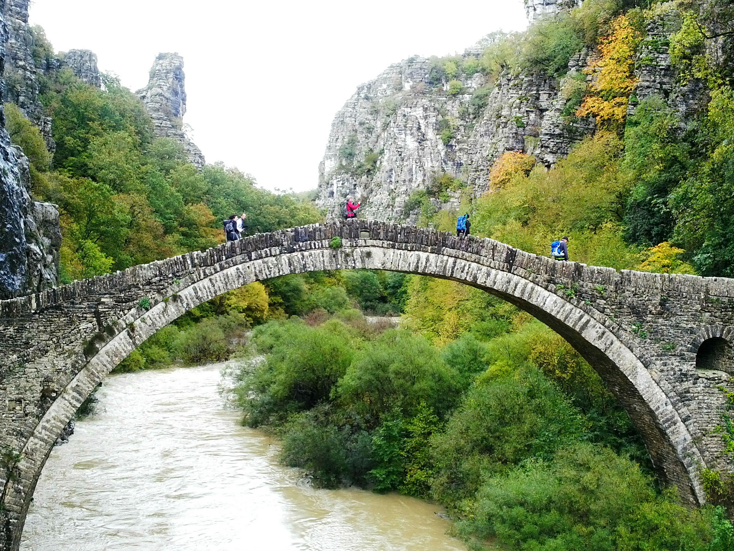 Crossing the ancient bridge in Greece, Zagori