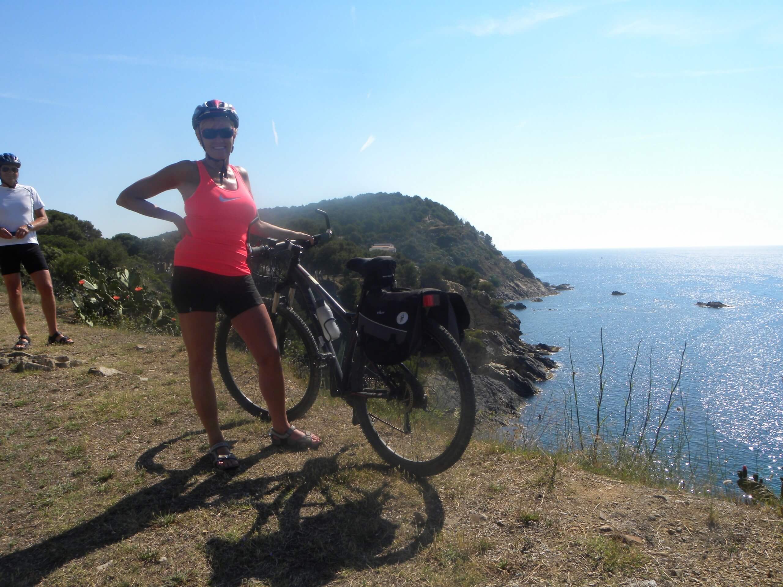 Cyclist posing near the shores of Costa Brava