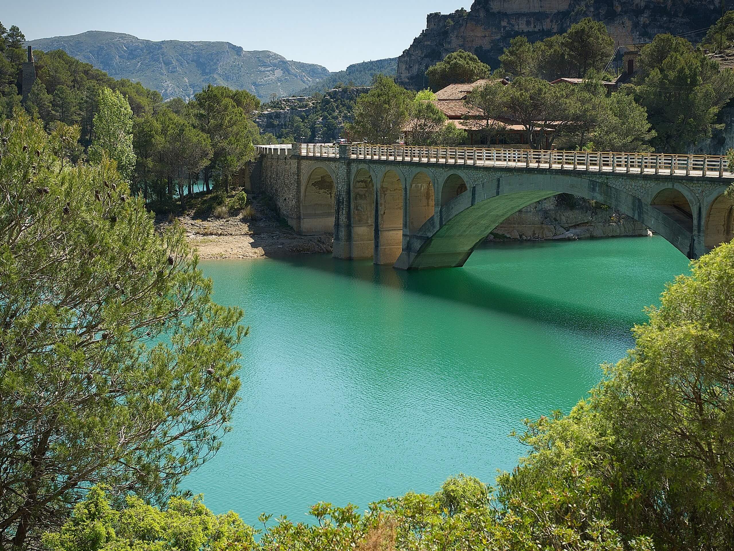 Beautiful rocky bridge over the turquoise water in Spain